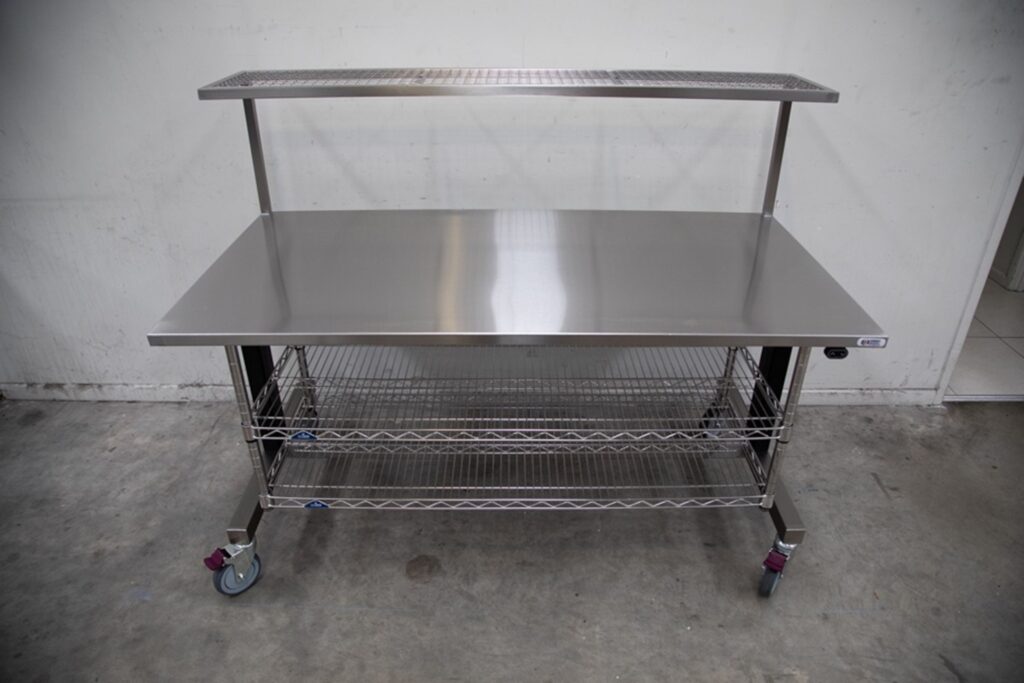 Height adjustable table food processing